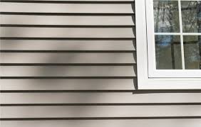Siding on a house with a partial window